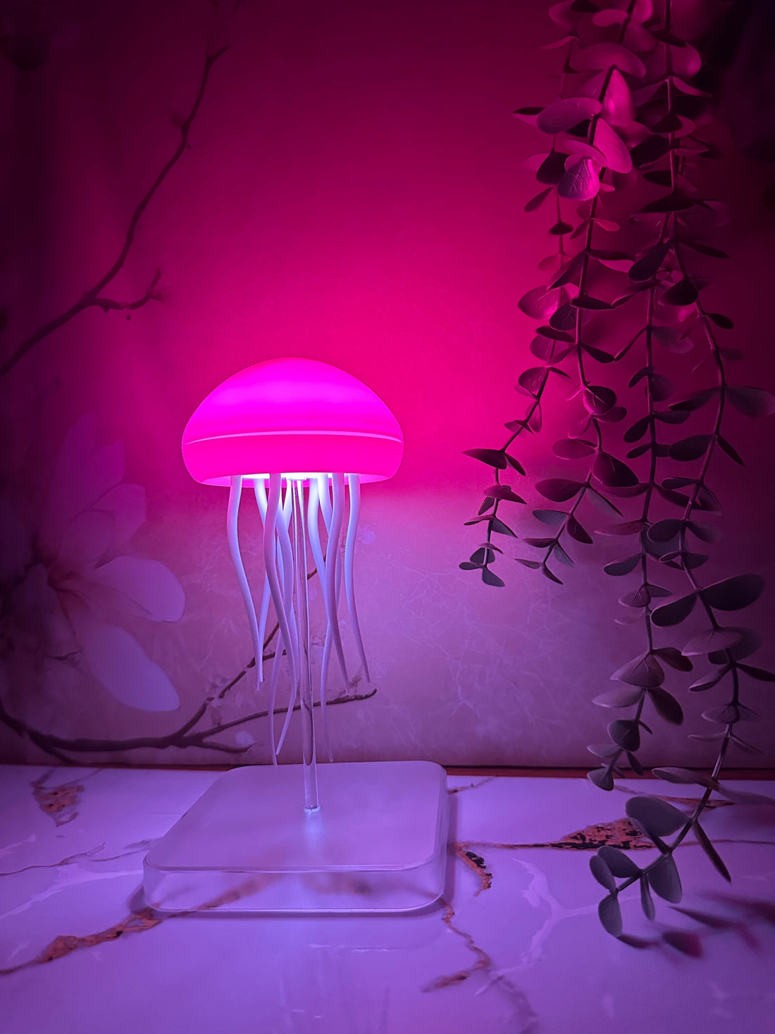 Mood lighting setup in a small apartment using soft ambient lights and the Lumora Lamp to make the space feel cozy and bigger.