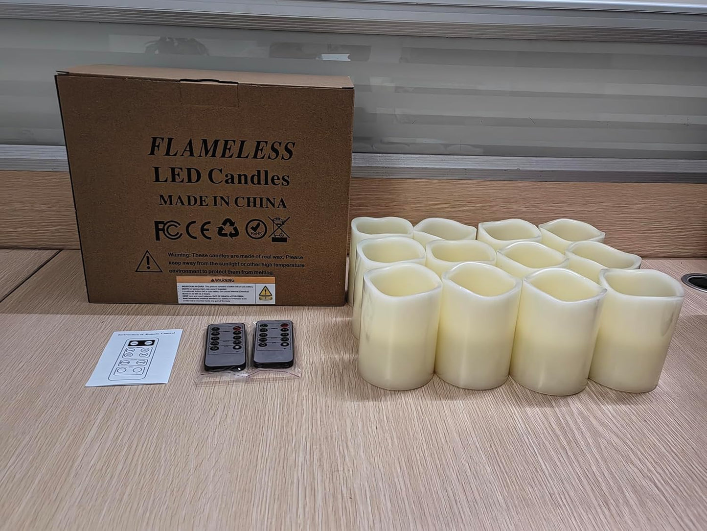 Flameless Candles Battery Operated Candles Set of 12 (D: 3" X H: 4") Real Wax Pillar Flickering Candles LED Flameless Candles with Remote and Timer Control (Ivory Color)